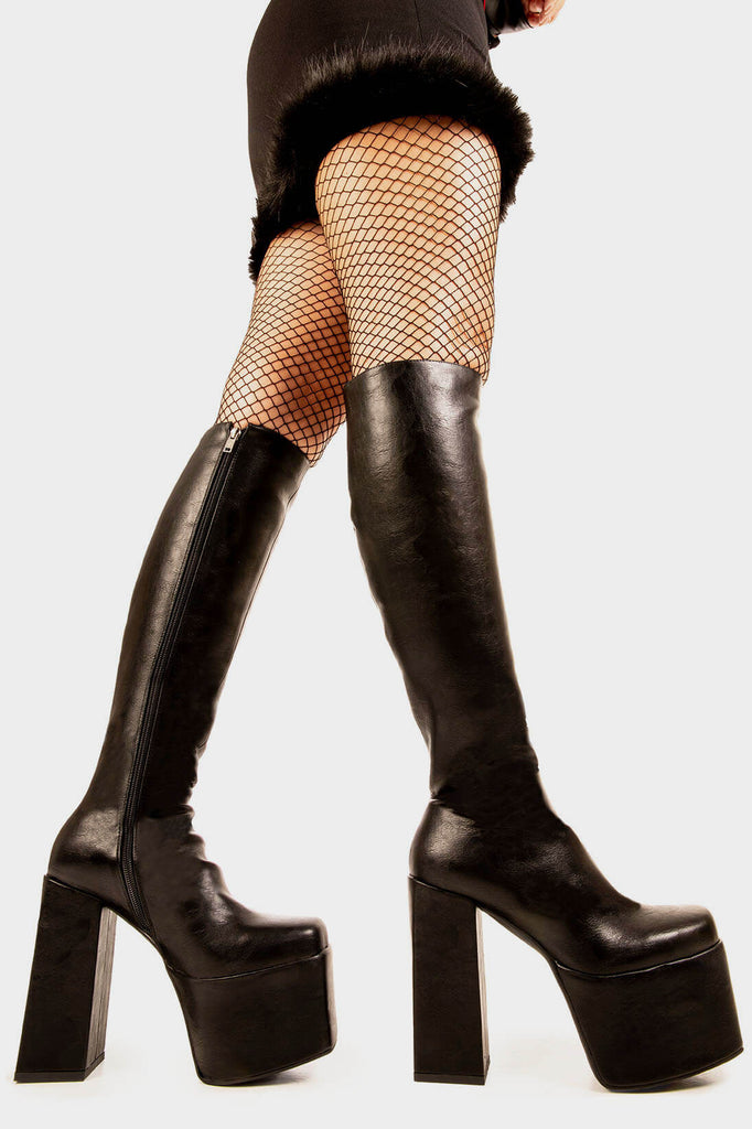 Sassy and Classy
 
 Obsession Platform Boots in Black faux leather. These black vegan Platform Boots feature on our chunky platform sole, perfect for any occasion. Made with eco-friendly materials and 100% cruelty-free, these platform boots are as ethical as they are fabulous.
 
 
 - Platform Height: 2.5 inch
 - Heel Height: 5.5 inch 
 - Black zipper 
 - Chunky Platform sole
 - Round Toe
 - 100% vegan 
 
 SKU: LMF 1897 - BlackPU