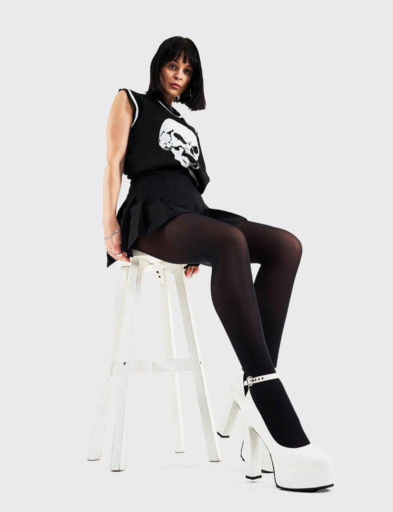 Head over Heels for these! Above Average Platform Heels in White faux leather. These platform heels feature a minimalist design with a thin ankle strap and silver buckle, perfect heels to compliment any outfit. Made with eco-friendly materials and 100% cruelty-free, these platform boots are as ethical as they are trendy. - Platform Height - Heel Height - Think ankle strap with a silver buckle and eyelets - High Heel - Platform sole - 100% vegan SKU: LMF 3100 - WhitePU