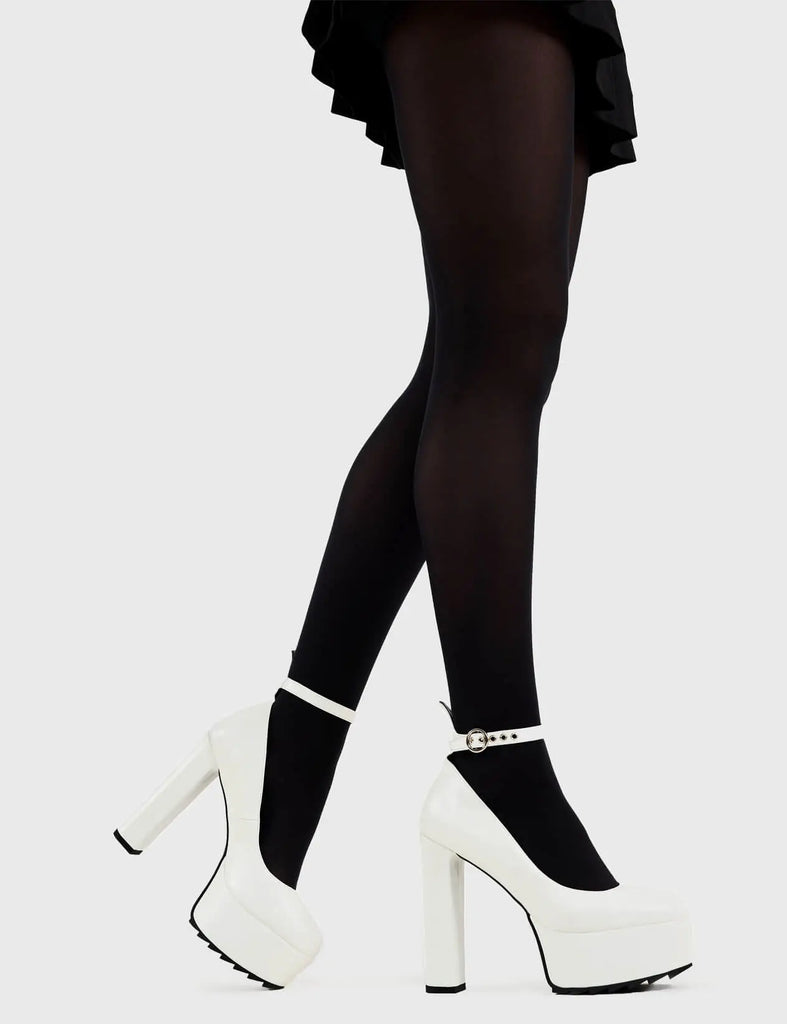 Head over Heels for these! Above Average Platform Heels in White faux leather. These platform heels feature a minimalist design with a thin ankle strap and silver buckle, perfect heels to compliment any outfit. Made with eco-friendly materials and 100% cruelty-free, these platform boots are as ethical as they are trendy. - Platform Height - Heel Height - Think ankle strap with a silver buckle and eyelets - High Heel - Platform sole - 100% vegan SKU: LMF 3100 - WhitePU