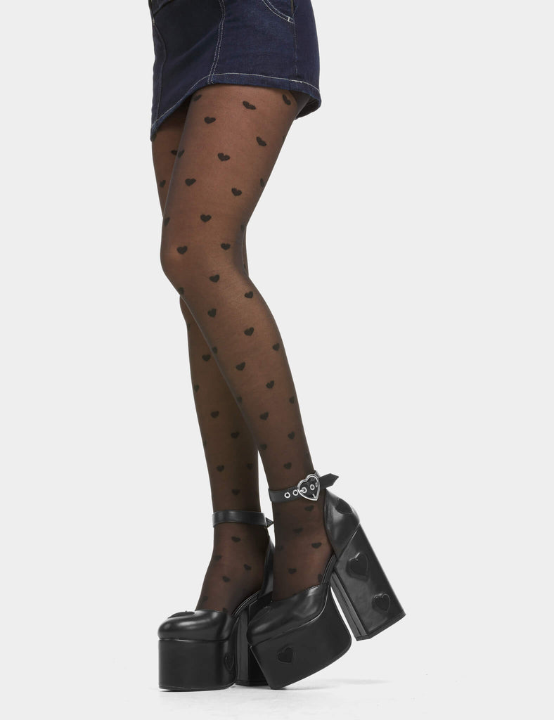 Love Story Sheer Tights in Black. Super stretchy fit, one size fits all! Featuring a classic sheer construction and with Black Hearts throughout.&nbsp;