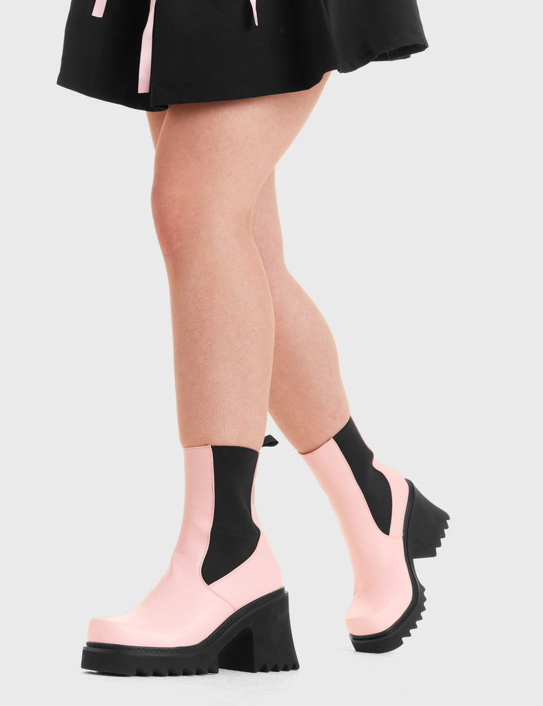 THESE BOOTS ARE MADE FOR WALKING Elevate Chunky Platform Ankle Boots in Pink faux leather. These vegan western Boots feature a black gusset and a shark teeth grip sole, very chic. Made with eco-friendly materials and 100% cruelty-free, these boots are as ethical as they are edgy! - Chunky Platform - Calf length - Shark teeth grip - Black gusset - Rounded toe - 100% vegan SKU: LMF 3728 - PinkPU