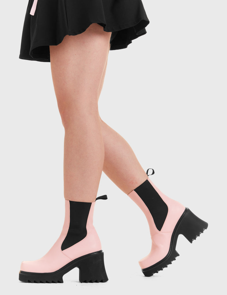THESE BOOTS ARE MADE FOR WALKING Elevate Chunky Platform Ankle Boots in Pink faux leather. These vegan western Boots feature a black gusset and a shark teeth grip sole, very chic. Made with eco-friendly materials and 100% cruelty-free, these boots are as ethical as they are edgy! - Chunky Platform - Calf length - Shark teeth grip - Black gusset - Rounded toe - 100% vegan SKU: LMF 3728 - PinkPU