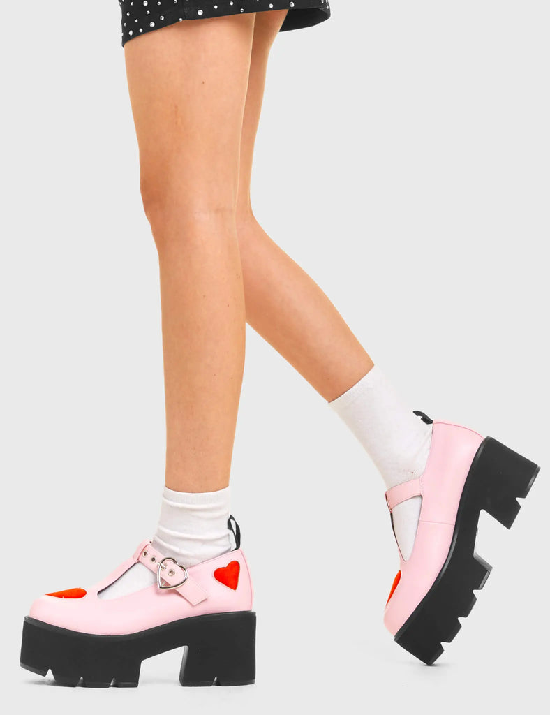 LOVABLE Fairytale Chunky Mary Jane Shoes in Pink faux leather. These vegan western Boots feature red hearts complimenting the adjustable heart buckled straps, very cute. Made with eco-friendly materials and 100% cruelty-free, these boots are as ethical as they are romantic! - Platformed - Ankle length - Silver heart buckle - Red hearts - Chunky black sole - Rounded toe - 100% vegan SKU: LMF 3902 - PinkPU/RedHeart