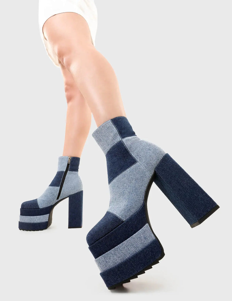 Denim Strides Hot Topic Platform Ankle Boots in Denim. These platform boots feature our iconic Denim finish, make a bold statement with every step. Made with eco-friendly materials and 100% cruelty-free, these platform boots are as ethical as they are Stylish. - Platform Height - Heel Height - Black Zip - Mid ankle length - Shark's teeth grip - Chunky Platform sole - Round Toe - 100% vegan SKU: LMF 2700 - Denim