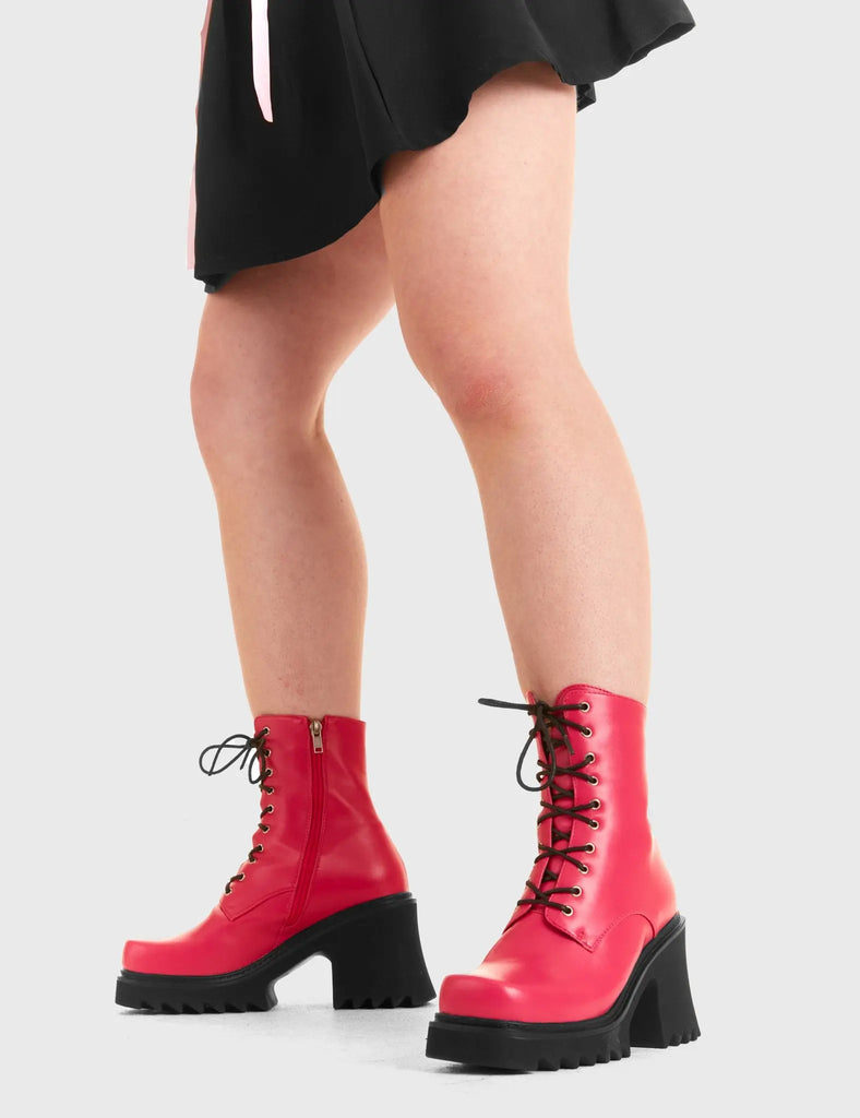 ON A HIGH In Opposition Chunky Platform Ankle Boots in Fuchsia faux leather. These vegan western Boots feature black laces and a shark teeth grip sole, very chic. Made with eco-friendly materials and 100% cruelty-free, these boots are as ethical as they are edgy! - Chunky Platform - Calf length - Shark teeth grip - Black laces - Rounded toe - 100% vegan SKU: LMF 3729 - FuchsiaPU
