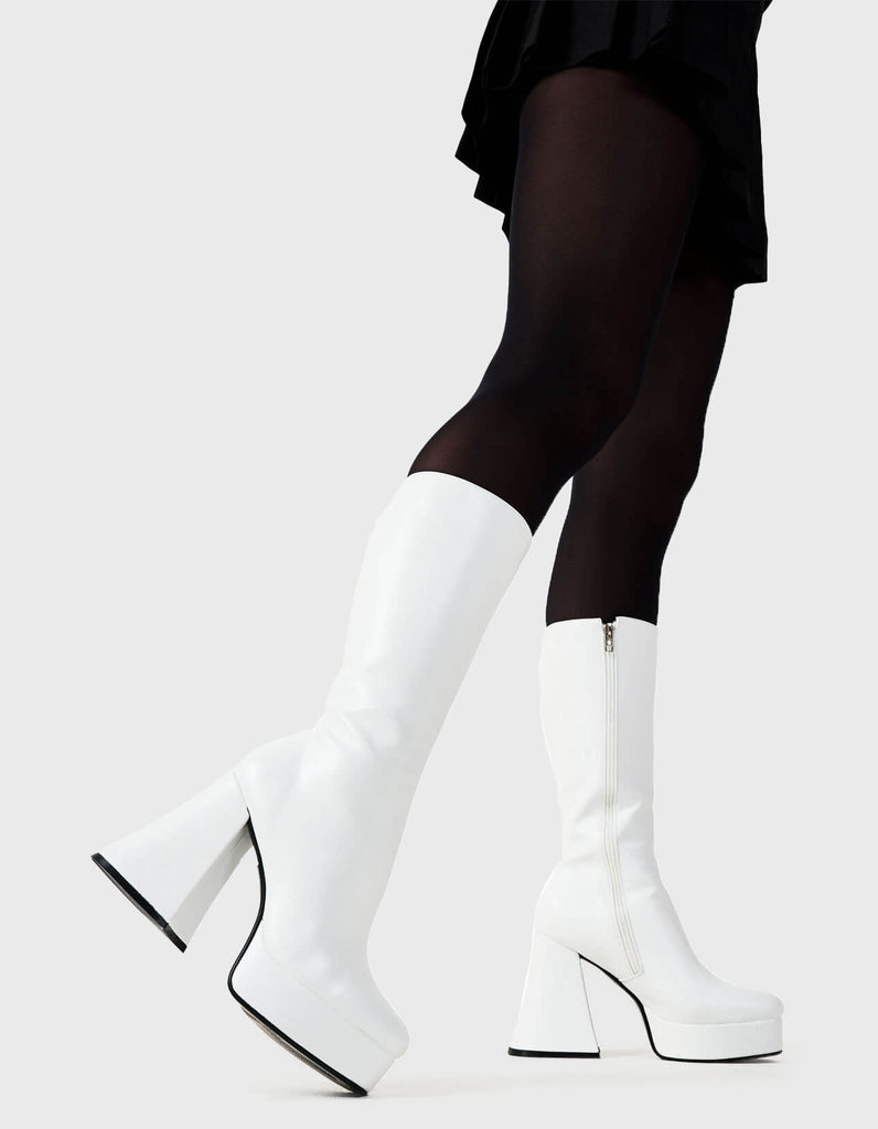 Obsessed Infatuation Platform Calf Boots in White faux leather. These white vegan Platform Boots feature on our platform sole, walking on platform dreams.Made with eco-friendly materials and 100% cruelty-free, these platform boots are as ethical as they are sexy. - Platform Height: 2.6 inch - Heel Height: 5.5 inch - Calf High length - White Zipper - Platform sole - Flared heel - Round Toe - 100% vegan SKU: LMF 1869 - White PU