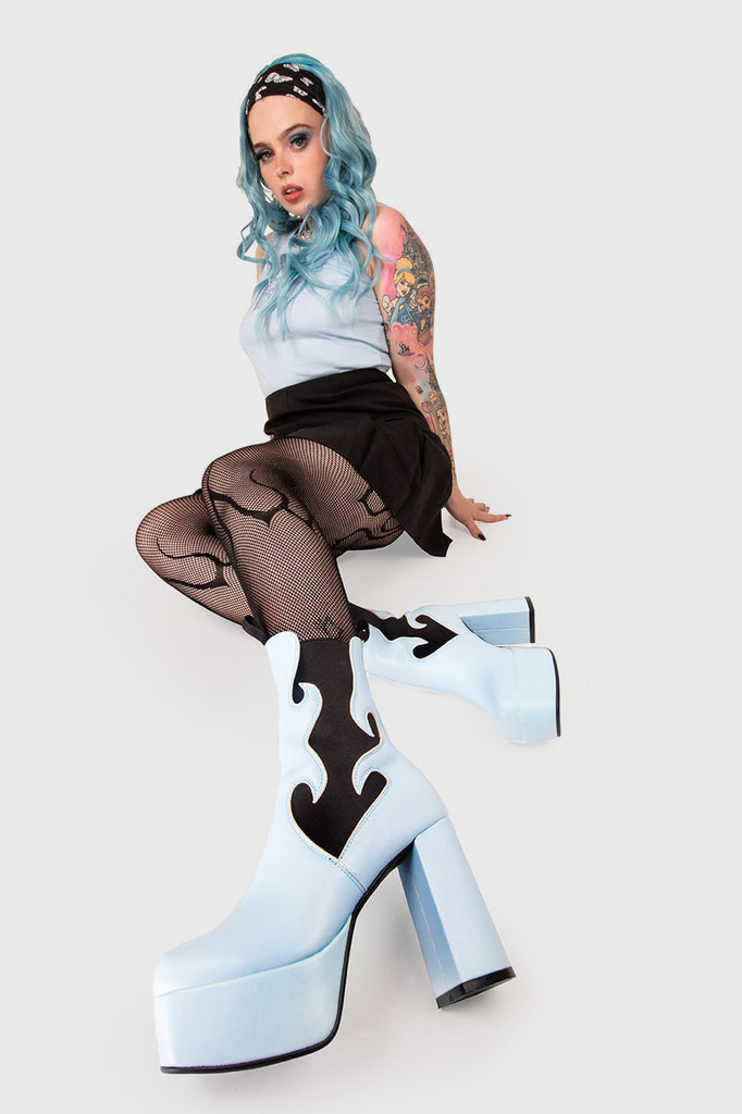 IT'S A VIBE Feelings Platform Ankle Boots in Blue faux leather. These blue platform boots feature a flame shaped stretchy gusset detail and two pull tabs, that adds to a more comfortable fit, On our platform sole. Made with eco-friendly materials and 100% cruelty-free, these platform boots are as ethical as they are Comfortable. - Platform Height - Heel Height - Ankle Length - Stretchy Gusset Detail - Pull Tabs - Platform Sole - Round Toe - 100% vegan SKU: LMF 1567 - BluePU