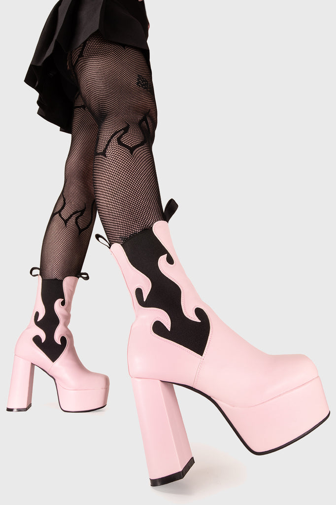 IT'S A VIBE Feelings Platform Ankle Boots in Pink faux leather. These blue platform boots feature a flame shaped stretchy gusset detail and two pull tabs, that adds to a more comfortable fit, On our platform sole. Made with eco-friendly materials and 100% cruelty-free, these platform boots are as ethical as they are Comfortable. - Platform Height - Heel Height - Ankle Length - Stretchy Gusset Detail - Pull Tabs - Platform Sole - Round Toe - 100% vegan SKU: LMF 1567 - PinkPU