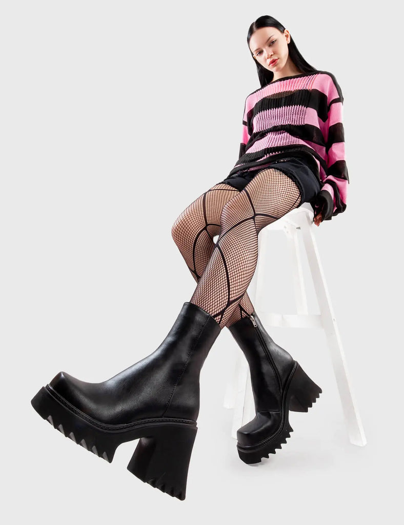 Anything But Basic Old Friend Chunky Platform Ankle Boots in Black faux leather. These platform boots feature an elegant, minimalist design, the perfect way to elevate any outfit. Made with eco-friendly materials and 100% cruelty-free, these platform boots are as ethical as they are cool. - Platform Height - Heel Height - Black Zip - Shark's teeth grip - Chunky Platform sole - 100% vegan SKU: LMF 2910 - BlackPU