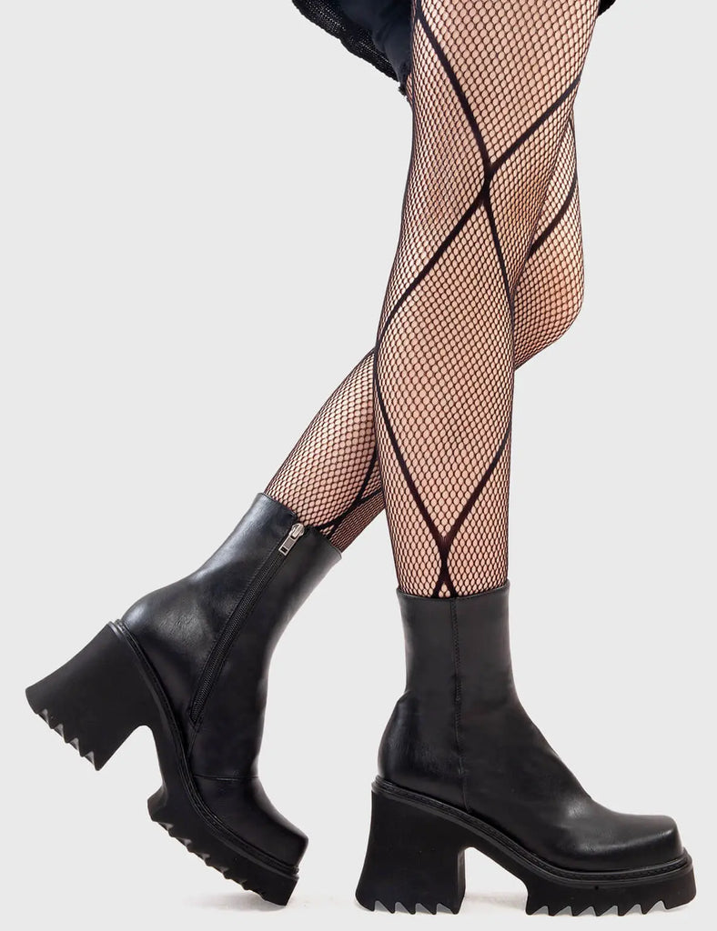 Anything But Basic Old Friend Chunky Platform Ankle Boots in Black faux leather. These platform boots feature an elegant, minimalist design, the perfect way to elevate any outfit. Made with eco-friendly materials and 100% cruelty-free, these platform boots are as ethical as they are cool. - Platform Height - Heel Height - Black Zip - Shark's teeth grip - Chunky Platform sole - 100% vegan SKU: LMF 2910 - BlackPU