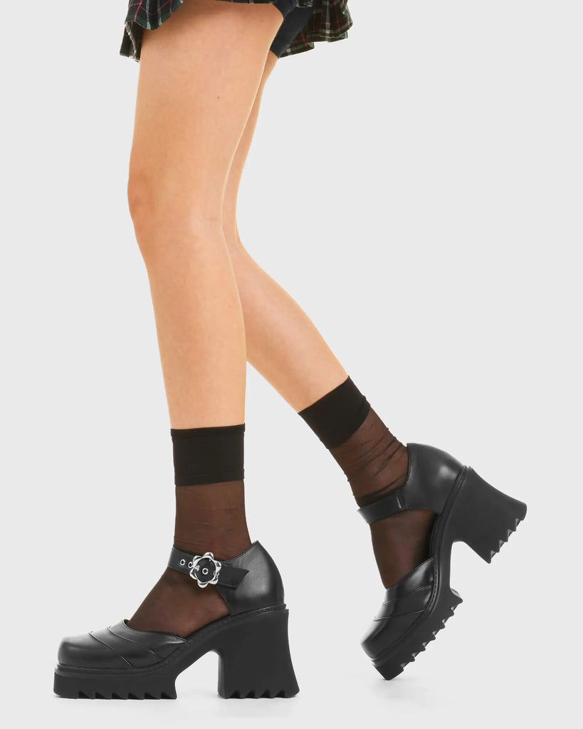 FLOWER GIRL On The Fence Chunky Mary Jane Shoes in Black Faux Leather. These vegan western Boots feature a silver flower buckle and a shark teeth grip sole, very classy. Made with eco-friendly materials and 100% cruelty-free, these boots are as ethical as they are edgy! - Chunky Platform - Ankle length - Shark teeth grip - Silver flower buckle - Rounded toe - 100% vegan SKU: LMF 3720 - BlackPU