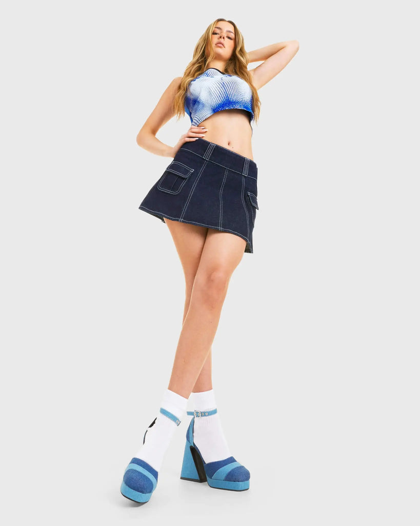 DENIM ON DENIM Placeholder Platform Heels in Light/Dark Denim. These vegan western Boots feature a Minimalist Design with a flared heel, perfect for a good time out. Made with eco-friendly materials and 100% cruelty-free, these boots are as ethical as they are Chic! - Platformed high heel - Ankle length - Mixed Denim - Rounded toe - 100% vegan SKU: LMF 3761 - Light/DarkDENIM