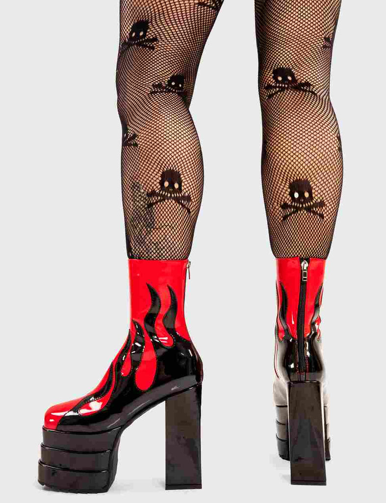 Set Things on Fire Reborn Platform Ankle Boots in Red faux leather. These platform boots feature a black flame design on our triple stack platform sole. Made with eco-friendly materials and 100% cruelty-free, these platform boots are as ethical as they are Fire. - Platform Height - Heel Height - Black zip - Flame design - High Heel - Triple Stack platform sole - 100% vegan SKU: LMF 2998 - RedPU/Flame