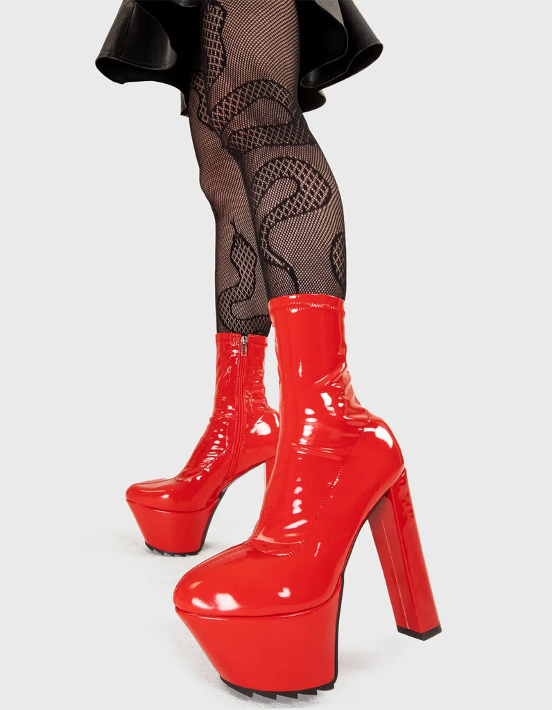 Not Your Basic Boots! So Sleek Platform Ankle Boots in Red Patent. These platform boots feature a minimalist design with a fitted feel, the perfect way to elevate any outfit. Made with eco-friendly materials and 100% cruelty-free, these platform boots are as ethical as they are eye-catching. - Platform Height - Heel Height - Red zip - High Heel - Pointed toe - Shark's Teeth Grip - 100% vegan SKU: LMF 3182 - RedPAT