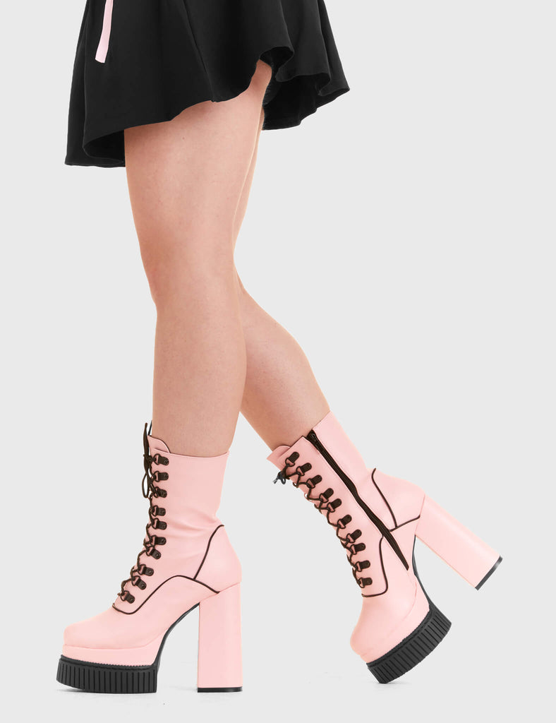 PRETTY IN PINK Stargazer Creeper Platform Ankle Boots in Pink faux leather. These vegan western Boots feature a lace up design and Black stitch detailing. Made with eco-friendly materials and 100% cruelty-free, these boots are as ethical as they are trendy! - Heel Height - Calf length - Black stitching - Black zip - Rubber grip sole - Rounded toe - 100% vegan SKU: LMF 3966 - PinkPU