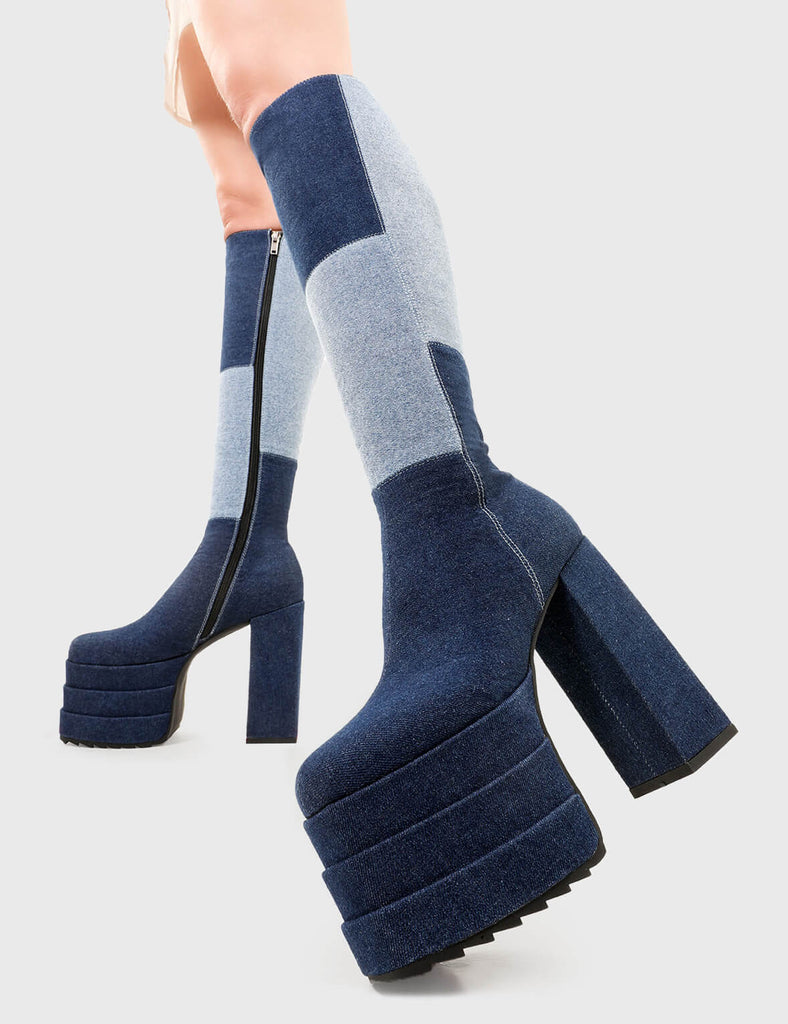 Denim Dolls Talk Of The Town Wide Calf Platform Knee High Boots in Denim. These platform boots feature our iconic Denim finish on a double stack platform sole, take centre stage with these jaw dropping boots. Made with eco-friendly materials and 100% cruelty-free, these platform boots are as ethical as they are Jaw dropping. - Platform Height - Heel Height - Wide fit - Black Zip - Knee high length - Shark's teeth grip - Chunky Platform sole - Round Toe - 100% vegan SKU: LMF 2701 - Denim - WIDE FIT