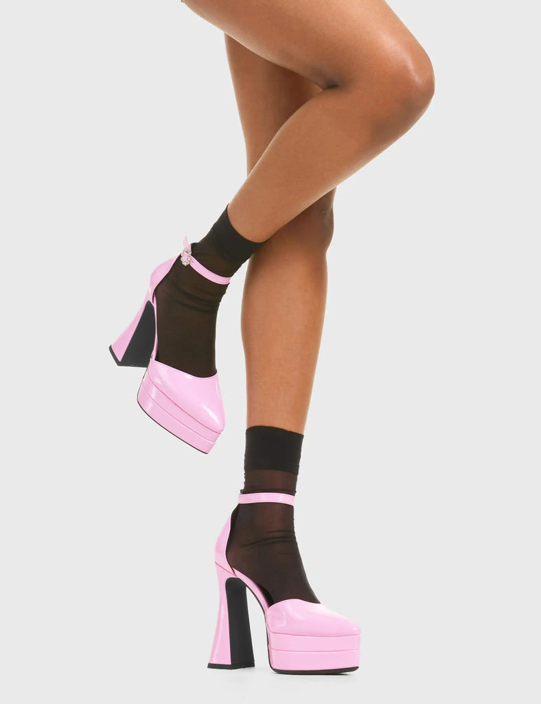 CATWALK READY Tear of Joy Platform Heels in Pink patent. These platform boots feature a minimalist look with a flared heel, keeping it nice and classy. Made with eco-friendly materials and 100% cruelty-free, these platform boots are as ethical as they are chic. - Platform Height - Adjustable strap - Flared heel - Pointed toe - High Heel - 100% vegan SKU: LMF 3525 - PinkPAT
