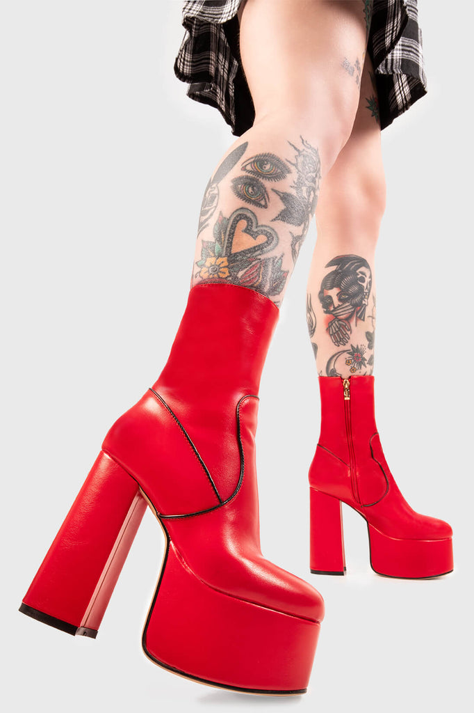 A TIMELESS CLASSIC
 
 Adore You Platform Ankle Boots in Red faux leather. These vegan Platform Ankle Boots feature a High Platform sole, making them the only choice to elevate your look! Made with eco-friendly materials and 100% cruelty-free, these boots are as ethical as they are wild!
 
 
 - Platform Height: 2.5 inch
 - Heel Height: 5.5 inch 
 - Mid ankle length 
 - Red zipper
 - High Platform sole
 - Round toe 
 - 100% vegan 
 
 SKU: LMF 0119 - RedPU