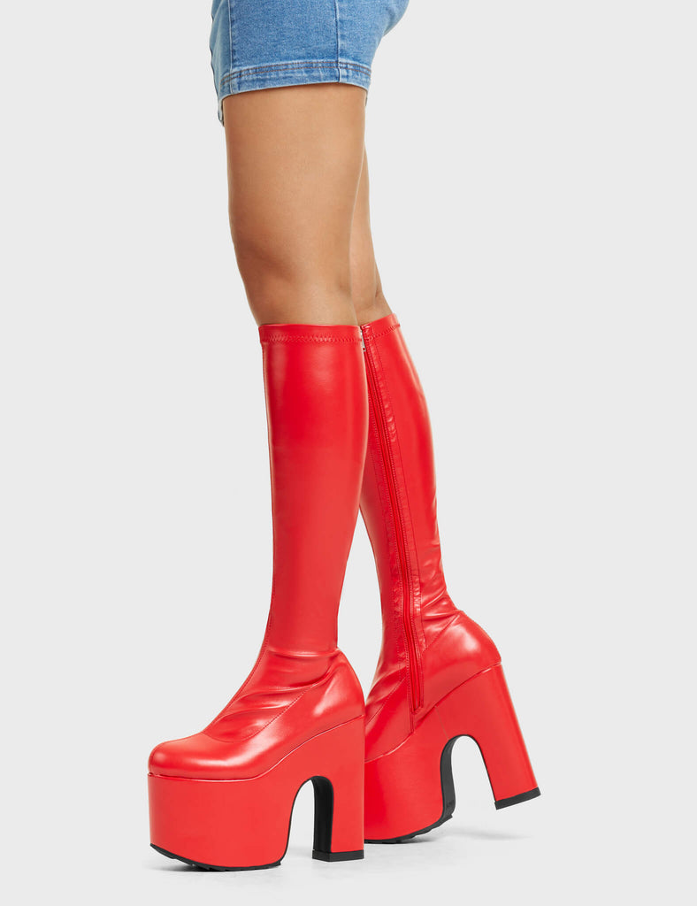 SPLIT PERSONALITY
 
 Awkward Chunky Platform Knee High Boots in Red stretch faux leather. These platform boots feature a minimalist look with a platformed chunky sole. Made with eco-friendly materials and 100% cruelty-free, these platform boots are made to perfection and are as ethical as they are chic.
 
 - Platform Height
 - Knee High Length
 - Fitted Feel
 - Rounded toe
 - Chunky Platform
 - 100% vegan
 
 SKU: LMF 5110 - RedPU