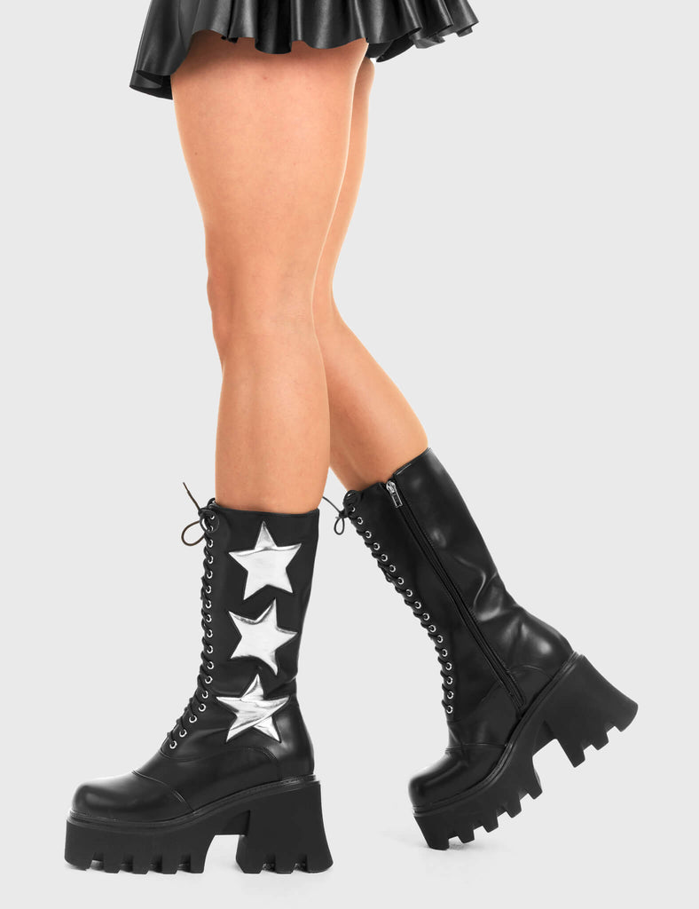 STARRY NIGHT
 
 Big League Chunky Platform Calf Boots in Black faux leather. These vegan western Boots feature a black lace up boot with silver stars , very classy. Made with eco-friendly materials and 100% cruelty-free, these boots are as ethical as they are edgy!
 
  
 - Chunky Platform
 - Calf length
 - Lace up
 - Silver stars
 - Rounded toe 
 - 100% vegan 
 
 SKU: LMF 3607 - BlackPU/SilverStar