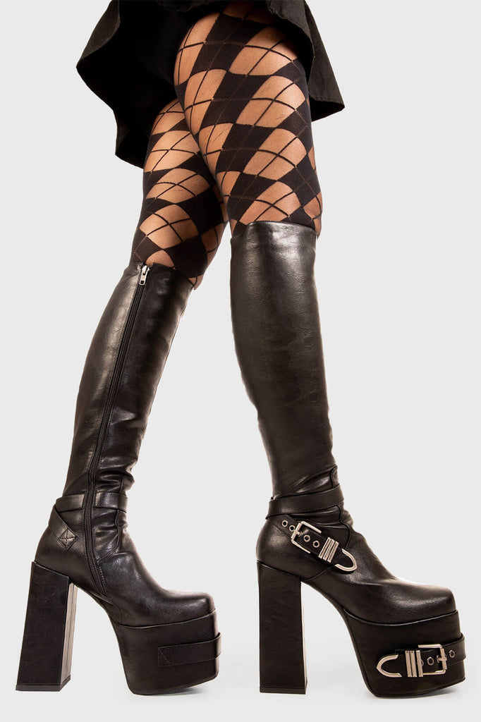 Savage Soles 
 
 Blair Platform Knee High Boots in Black faux leather. These black vegan Platform Boots feature on our chunky platform sole with a adjustable buckle on the heel and on the side of the boot, embracing the edge. Made with eco-friendly materials and 100% cruelty-free
 .
 
 - Platform Height: 2.5 inch
 - Heel Height: 5.5 inch 
 - Black zipper 
 - Black strap and silver eyelets
 - Square shaped buckles 
 - Chunky Platform sole
 - Round Toe
 - 100% vegan 
 
 SKU: LMF 1899 - BlackPU