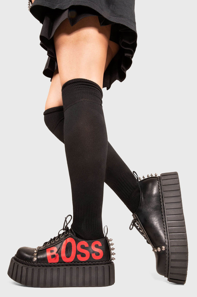 Kicking Sass.
 
 Boss Babe Chunky Creeper shoe in Black faux leather. These vegan creeper shoes feature a "BOSS" red lettering on the side on our chunky sole to highten your attitude. Made with eco-friendly materials and 100% cruelty-free, these Chunky Creeper shoes are as ethical as they are bossy!
 
 - Platform Height: 2.3 inch
 - Black Laces
 - Silver eyelets
 - "BOSS" red lettering
 - Silver spikes 
 - Chunky creeper sole
 - Round toe
 - 100% vegan
 
 SKU: LMF 1592 - Black/Red