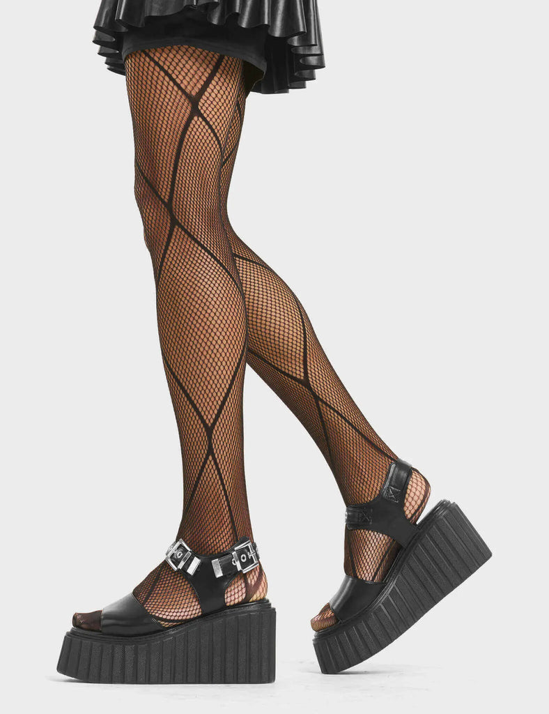 EMBRACE
 
 Butterflies Chunky Platform Creeper Sandals in Black faux leather. These creeper sandals feature cut out strap design, including an adjustable strap with silver eyelets and sqaure shaped buckles, walk with love. Made with eco-friendly materials and 100% cruelty-free, these platform sandals are as ethical as they are Loving!
 
 - Platform Height
 - Adjustable ankle strap design
 - Silver eyelets
 - Square shaped buckles
 - Platform creeper sole
 - Open Toe
 - 100% vegan
 
 SKU: LMF 4517 - BlackPU