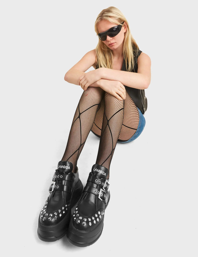 Changing Chunky Sneakers in Black. Featuring an silver studs and adjustable straps.