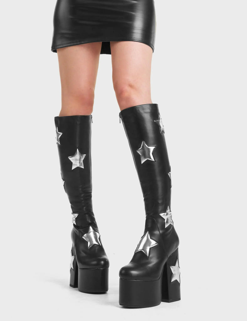 Comet Platform Knee High Boots in Black. These Platform Knee High Boots feature Silver Stars.
