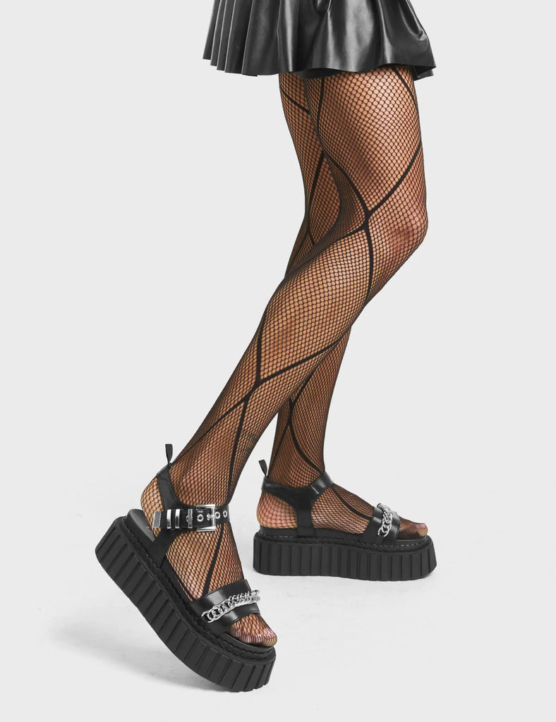BELIEVE

Convincing Chunky Platform Creeper Sandals in Black faux leather. These creeper sandals feature a strap design, including a adjustable strap across the ankle, with silver eyelets and a square shaped buckle. Also incldues a aesthetic sliver chain. Made with eco-friendly materials and 100% cruelty-free, these sandals are as ethical as they are edgy

- Platform Height
- Silver Eyelets
- Square Shaped Buckles
- Silver Chain
- Platform Creeper Sole
- Open Toe
- 100% vegan

SKU: LMF 4407 - BlackPU