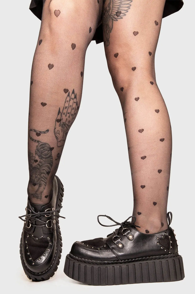 Solemates
 
 Cryptic Love Chunky Creeper Shoes in Black faux leather. These Black vegan creeper shoes feature two black suede hearts on the upper and to the side of the shoe , falling in love one step at a time. Made with eco-friendly materials and 100% cruelty-free, these creeper shoes are as ethical as they are loveable!
 
 
 - Platform Height: 2.3 inch
 - Black laces 
 - Silver eyelets
 - Black suede hearts
 - Silver studs 
 - Chunky Creeper sole
 - Round Toe
 - 100% vegan 
 
 SKU: LMF 1582 - BlackPU