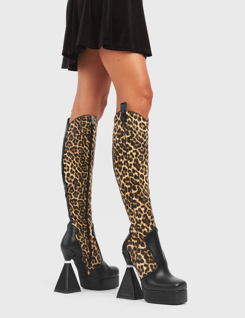 UNFORGETTABLE
 
 Curious Platform Knee High Boots in black and leopard faux leather. These platform boots feature a chic look with a flared heel that includes silver ring detailing on the heel, keeping it nice and classy. These heels also feature a functional zip on the leopard detailed upper. Made with 100% vegan materials. 
 
 - Platform Height
 - Leopard Design
 - Functional Zip
 - Flared Heel
 - Silver Ring Detail
 - Round Toe
 - 100% vegan
 
 SKU: LMF 5442 - BlackPU/Leo