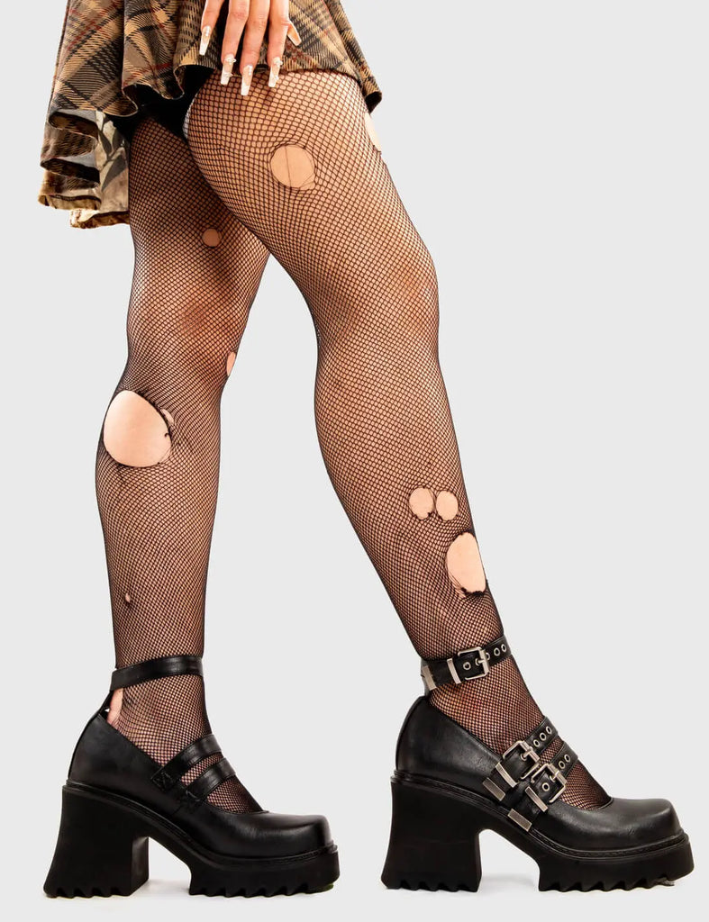 THE SHOEDROBE STAPLE
 
 Displaced Chunky Mary Jane Shoes in Black faux leather. These Mary Janes feature three adjustable straps with silvery eyelets and silver buckles, along with a Chunky and comfortable Platform sole. Everyone needs a pairs of Mary Janes! Made with eco-friendly materials and 100% cruelty-free
 
 - Platform Height:
 - three adjustable straps
 - Square buckles and silver eyelets
 - Chunky Platform sole
 - Round toe 
 - 100% vegan 
 
 SKU: LMF 2908 - BlackPU