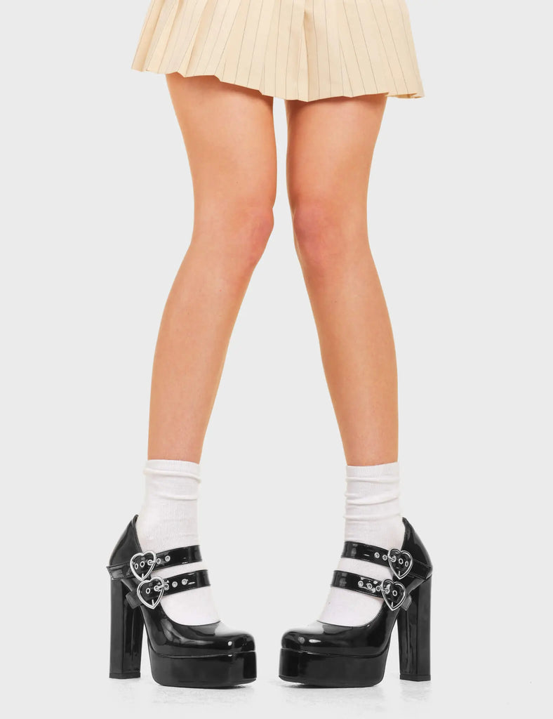 MIND BLOWING
 
 Do It Right Platform Heels Black Patent. These platform heels feature two adjustable ankle straps with silver buckles and eyelets. Made with eco-friendly materials and 100% cruelty-free, these platform boots are as ethical as they are chic.
 
 - Platform Height
 - Two adjustable strap
 - Silver buckles and Eyelets
 - High heel
 - Pointed toe
 - Block Heel
 - 100% vegan 
 
 SKU: LMF 3789 - BlackPAT