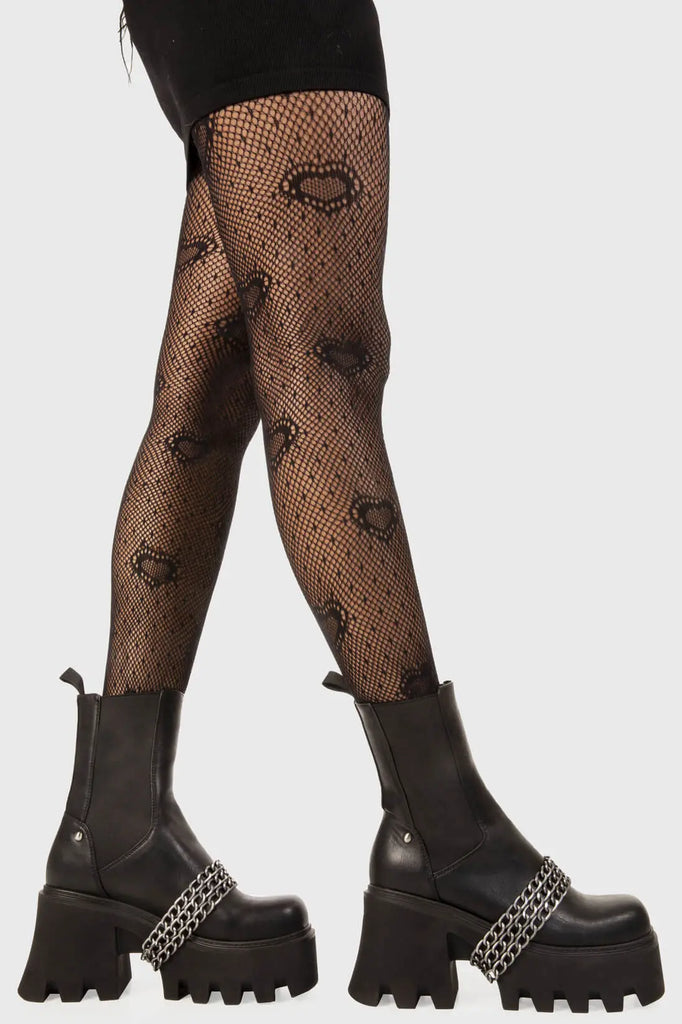 Chain Fever 
 
 Evening Stroll Chunky Platform Ankle Boots in Black faux leather. These black platform boots feature three silver chains across the upper with a stretchy gusset detail, ignite your presence. Made with eco-friendly materials and 100% cruelty-free, these platform boots are as ethical as they are Amazing!
 
 - Platform Height
 - Stretchy gusset detail
 - Wide ankle and calf friendly
 - Three silver chains
 - Chunky Platform sole
 - Round Toe 
 - 100% vegan 
 
 SKU: LMF 2250 - BlackPU