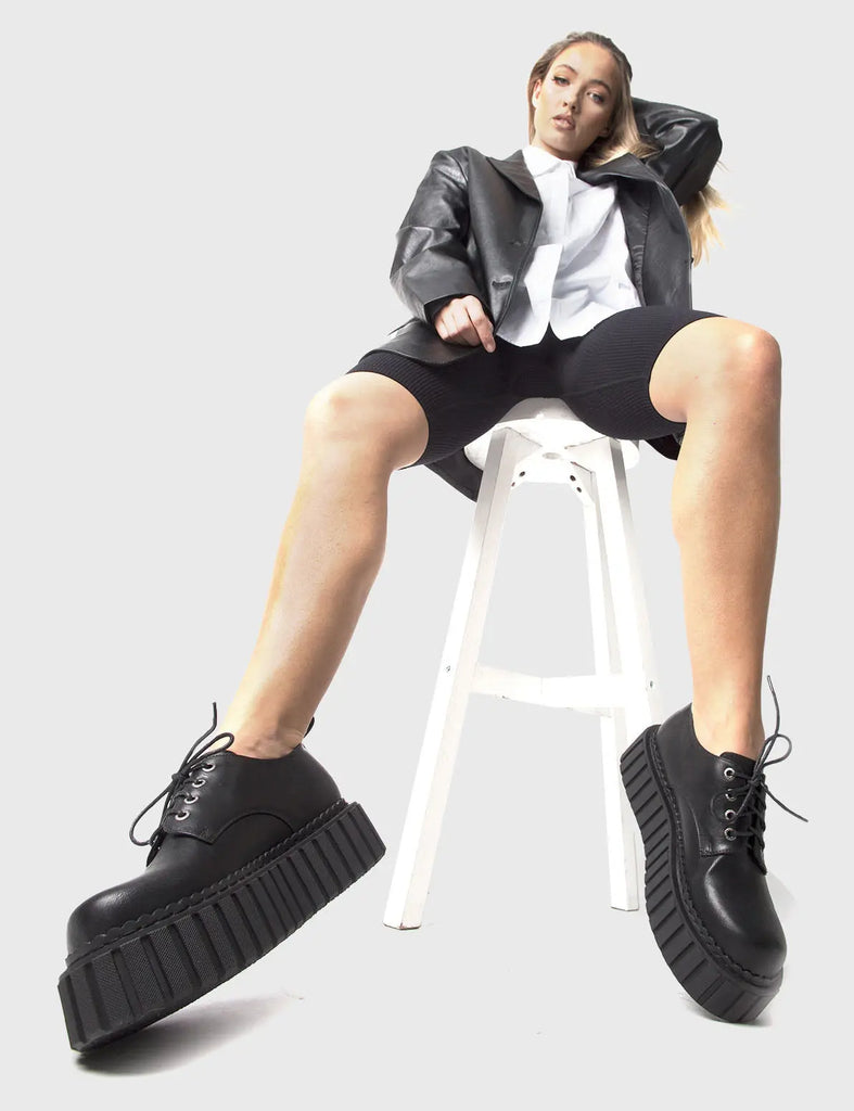 ANYTIME, ANYWHERE
 
 Freaky Creepy Chunky Creepers in Black faux leather. These classic creeprs feature a Chunky and comfortable Platform Creeper sole. Everyone needs a pairs of Creepers! Made with eco-friendly materials and 100% cruelty-free, these Creepers are as ethical as they are timeless!
 
 
 - Platform Height: 2.3 inch
 - Lace up
 - Chunky Platform Creeper sole
 - Round toe 
 - 100% vegan 
 
 SKU: LMF 861 - Black PU