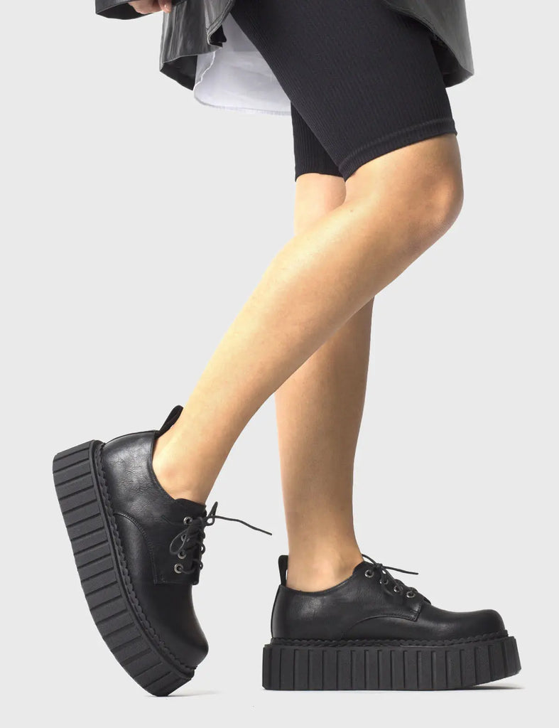 ANYTIME, ANYWHERE
 
 Freaky Creepy Chunky Creepers in Black faux leather. These classic creeprs feature a Chunky and comfortable Platform Creeper sole. Everyone needs a pairs of Creepers! Made with eco-friendly materials and 100% cruelty-free, these Creepers are as ethical as they are timeless!
 
 
 - Platform Height: 2.3 inch
 - Lace up
 - Chunky Platform Creeper sole
 - Round toe 
 - 100% vegan 
 
 SKU: LMF 861 - Black PU