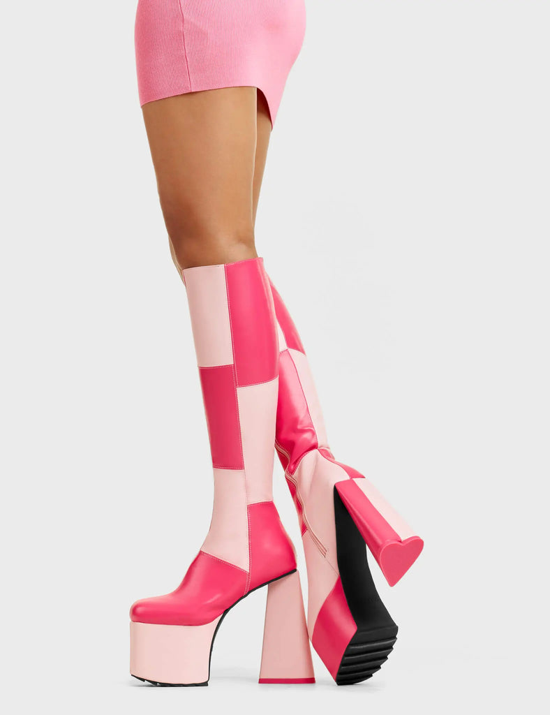 DOUBLE TROUBLE
 
 Getting Better Platform Knee High Boots in Pink and Fuchsia faux leather. These platform boots feature a pink and fuchsia patch work design with a heart shaped heel that has a heart detailing at the bottom, keeping it nice and classy. Made with eco-friendly materials and 100% cruelty-free, these platform boots are as ethical as they are chic.
 
 - Platform Height
 - Knee High Length
 - Patch Work Design
 - Heart Heel
 - Heart Detail 
 - 100% Vegan
 
 SKU: LMF 4904 - Pink/FuchsiaPU