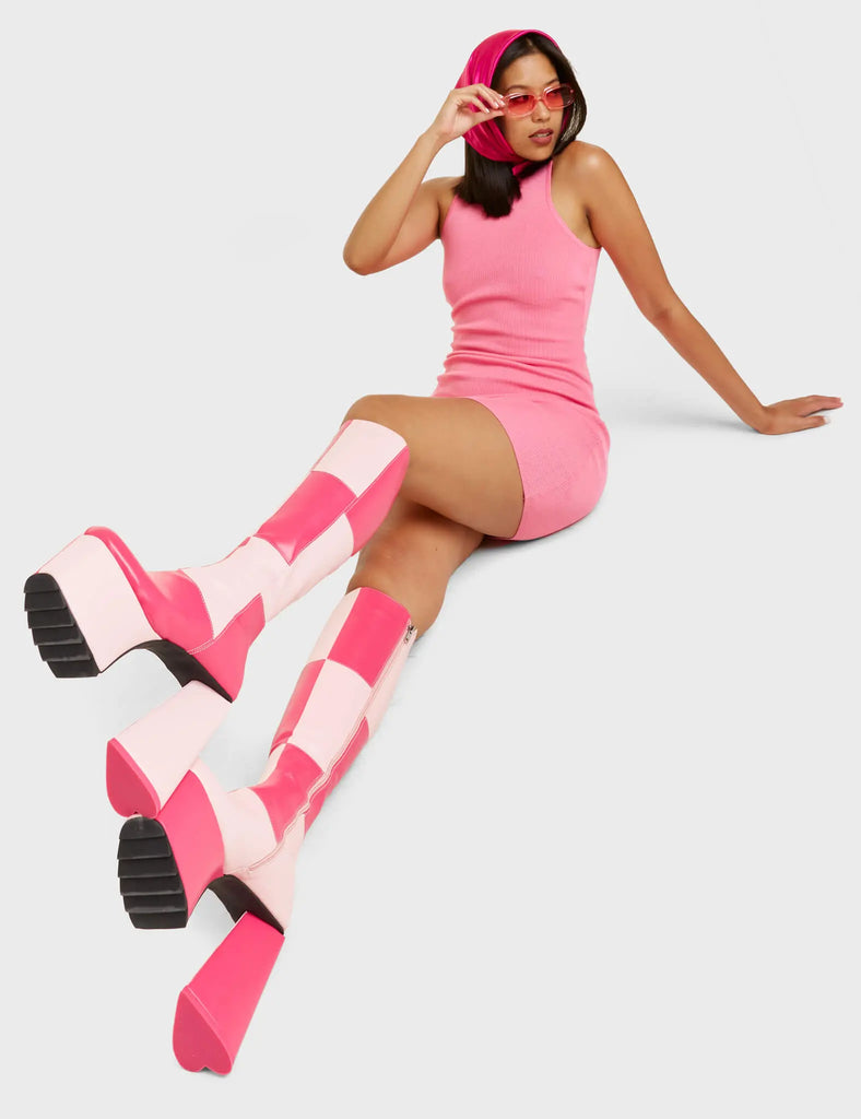 DOUBLE TROUBLE
 
 Getting Better Platform Knee High Boots in Pink and Fuchsia faux leather. These platform boots feature a pink and fuchsia patch work design with a heart shaped heel that has a heart detailing at the bottom, keeping it nice and classy. Made with eco-friendly materials and 100% cruelty-free, these platform boots are as ethical as they are chic.
 
 - Platform Height
 - Knee High Length
 - Patch Work Design
 - Heart Heel
 - Heart Detail 
 - 100% Vegan
 
 SKU: LMF 4904 - Pink/FuchsiaPU