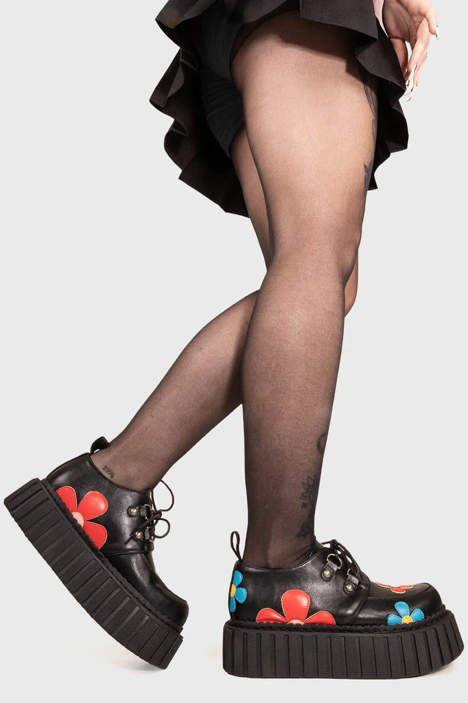 Blooming Beauties
 
 Give A little Chunky Creeper Shoes in Black faux leather. These Black vegan creeper shoes feature Red and Blue flowers throughout on our chunky sole empowering your blooming beauty. Made with eco-friendly materials and 100% cruelty-free, these creeper shoes are as ethical as they are beautiful!
 
 
 - Platform Height: 2.3 inch
 - Black laces 
 - Silver eyelets
 - Red and Blue Flowers
 - Chunky Creeper sole
 - Round Toe
 - 100% vegan 
 
 SKU: LMF 1588 - BlackPU/MultiFlower