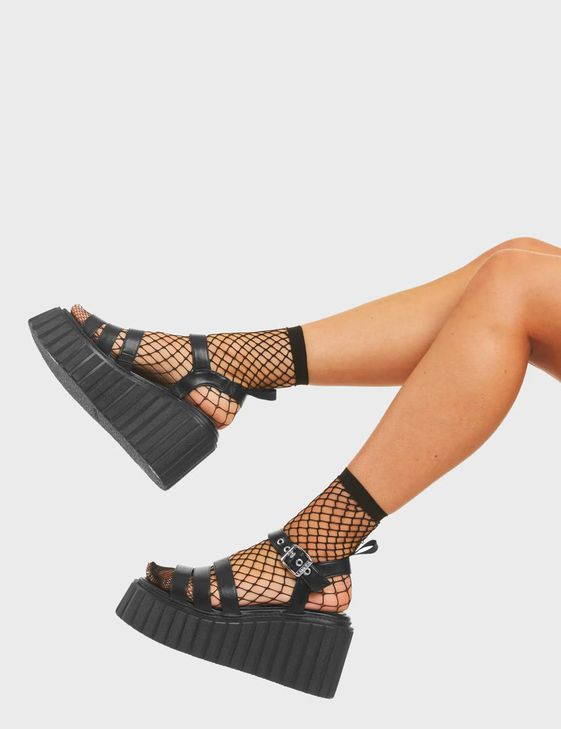 NO CREEPING

Good Day Chunky Platform Creeper Sandals in Black faux leather. These creeper sandals feature multiple straps, including an adjustable strap with silver eyelets and a sqaure shaped buckle, walk with love. Made with eco-friendly materials and 100% cruelty-free, these platform boots are as ethical as they are Loving!

- Platform Height
- Multiple black strap design
- Silver eyelets with square shaped buckle
- Pull Tab
- Platform creeper sole
- Round Toe
- 100% vegan

SKU: LMF 4515 - BlackPU