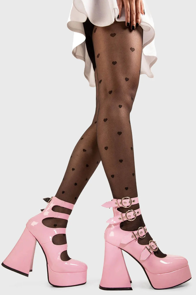 Stellar Stompers
 
 Interstellar Platform Heels in Pink Patent faux leather. These vegan Platform Heels feature four adjustable pink patent ankle straps with ""O"" ring buckles and silver eyelets on a platform sole, stepping into stellar universe. 
 
 - Platform Height: 2.6 inch
 - Heel Height: 5.5 inch
 - Four adjustable pink patent strap
 - Silver eyelets 
 - ""O"" ring buckles
 - Platform sole
 - Flared heel
 - Round toe
 - 100% vegan
 
 SKU: LMF 1704 - PinkPAT