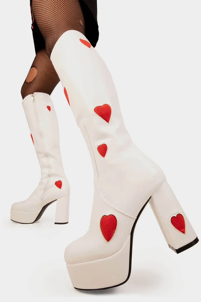 THE ONE FROM INSTA'

Jam Tarts Platform Knee High Boots in White faux leather. These White vegan Boots feature our ICONIC Red faux suede hearts and Platform sole and heel, perfect for adding height and style to any outfit. Made with eco-friendly materials and 100% cruelty-free, these boots are as ethical as they are cute!


- Platform Height: 1.25 inch
- Heel Height: 4.2 inch
- Knee High length
- Red Hearts
- White zipper 
- Platform sole
- Round Toe
- 100% vegan 

SKU: LMF 0916 - White/RedHeart