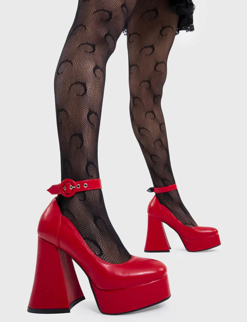 The Main Attraction 
 
 Last Flight Platform Heels in Red faux leather. These red platform heels feature a red adjustable ankle strap with silver eyelets and 'O' ring shaped buckle, let your shoes take you center stage. Made with eco-friendly materials and 100% cruelty-free.
 
 - Platform Height
 - Heel Height
 - Red adjustable ankle strap
 - Silver eyelets with 'O' ring shaped buckle
 - Platform sole
 - Round Toe 
 - 100% vegan 
 
 SKU: LMF 2327 - RedPU