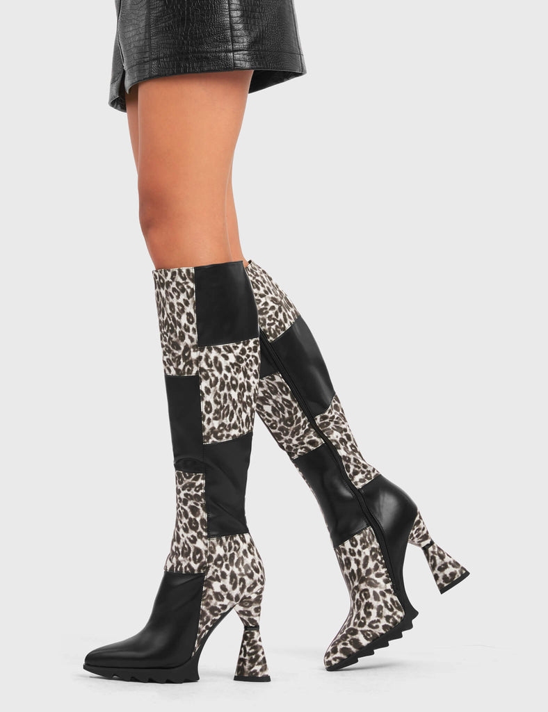 50ml LOVER

Love Shot Platform Knee High Boots in black and leopard faux leather. These platform boots feature a flared heel that includes black ring detailing on the heel, keeping it nice and classy. These heels also feature a heart shaped heel with a black heart at the bottom, in addition to a functional zip on the leopard detailed upper. Made with 100% vegan materials.

- Platform Height
- Leopard Design
- Functional Zip
- Heart Heel
- Black Heart
- Round Toe
- 100% vegan

SKU: LMF 5414 - BlackPU/Leo