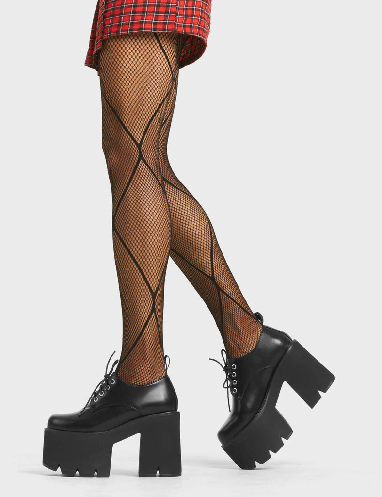 LOVE ANIMAL
 
 Monster Chunky Platform Shoes in Black faux leather. These vegan shoes feature a lace up minimalist design, very cute. Made with eco-friendly materials and 100% cruelty-free, these shoes are as ethical as they are chic!
 
 
 - Platform.
 - Heels
 - Lace up
 - Chunky platform sole
 - Rounded toe
 - 100% vegan
 
 SKU: LMF 4850 - BlackPU