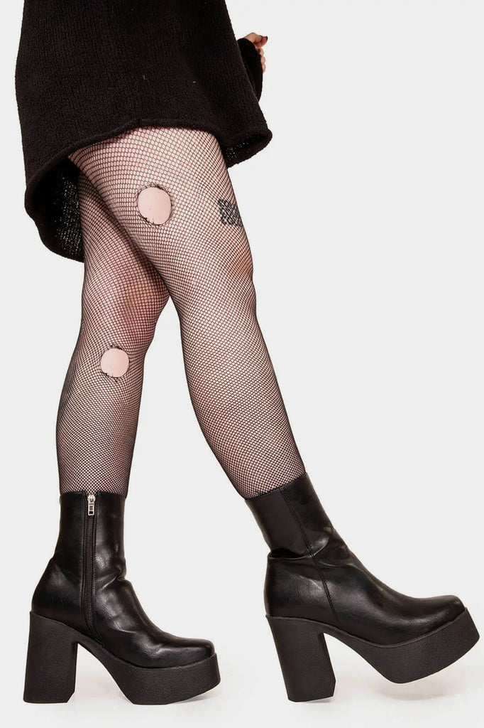 THE TRENDING ONE
 
 My Hero Platform Ankle Boots in Black faux leather. These Black vegan Ankle Boots feature an elegant clutter free design and a Platform sole and heel, perfect for adding height and style to any outfit. Made with eco-friendly materials and 100% cruelty-free, these boots are as ethical as they are stylish.
 
 
 - Platform Height: 1.25 inch
 - Heel Height: 4 inch
 - Low ankle length
 - Black zipper 
 - Platform sole
 - Square toe 
 - 100% vegan 
 
 SKU: LMF 1211 - BlackPU