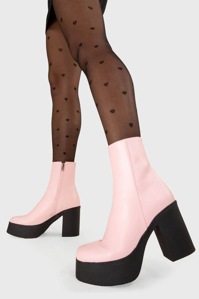 THE TRENDING ONE
 
 My Hero Platform Ankle Boots in Pink faux leather. These Black vegan Ankle Boots feature an elegant, minimalist design and a Platform sole and heel, perfect for adding height and style to any outfit. Made with eco-friendly materials and 100% cruelty-free, these boots are as ethical as they are stylish.
 
 
 - Platform Height: 1.25 inch
 - Heel Height: 4 inch
 - Low ankle length
 - Pink zipper 
 - Platform sole
 - Square toe 
 - 100% vegan 
 
 SKU: LMF 1211 - PinkPU