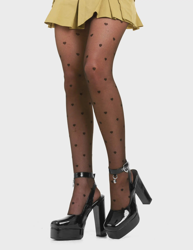 STEP FREELY
 
 My Way Platform Heels in Black Patent. These heels features a adjustable black ankle strap with silver eyelets and a heart shaped buckle, Also features a silver hanging charm Step Freely with these platform heels. Made with eco-friendly materials and 100% cruelty-free!
 
 - Platform Height
 - Heel Height
 - Adjustable Black Strap
 - Silver eyelets
 - Heart shaped buckle
 - Platform sole
 - Pointed Toe
 - 100% vegan
 
 SKU: LMF 3791 - BlackPAT