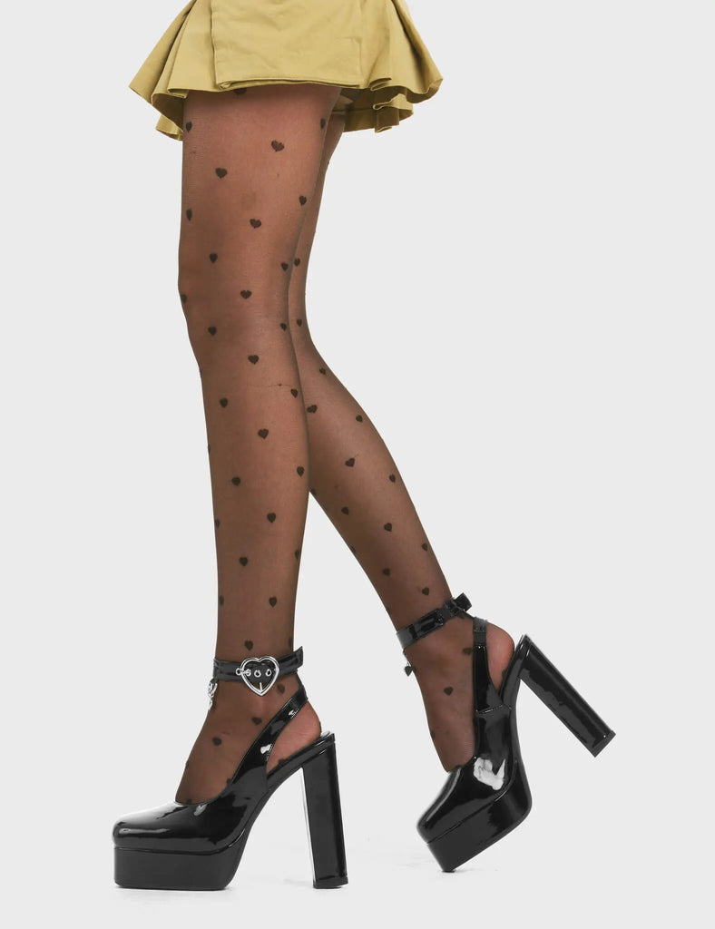 STEP FREELY
 
 My Way Platform Heels in Black Patent. These heels features a adjustable black ankle strap with silver eyelets and a heart shaped buckle, Also features a silver hanging charm Step Freely with these platform heels. Made with eco-friendly materials and 100% cruelty-free!
 
 - Platform Height
 - Heel Height
 - Adjustable Black Strap
 - Silver eyelets
 - Heart shaped buckle
 - Platform sole
 - Pointed Toe
 - 100% vegan
 
 SKU: LMF 3791 - BlackPAT